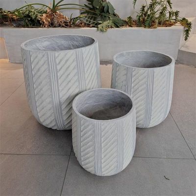 acheter Planteur en fibre d'argile ronde de surface texturée D480*H480 pour des arrangements de plantes élégants online manufacture
