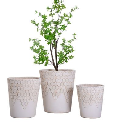 acheter Pot de fleurs rond en fibre d'argile beige neutre à motif nid d'abeille lisse online manufacture