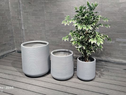 Planteur à fleurs rondes en fibre bleue d'argile avec drainage