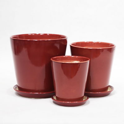 Des pots en céramique à fleurs modernes avec un trou de drainage